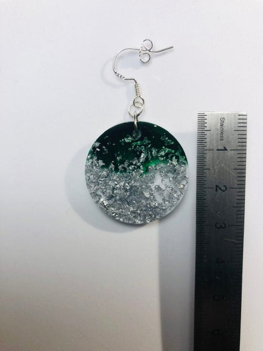Green resin earrings with silver metal inserts