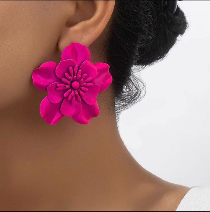 Oversized floral fuchsia earrings.